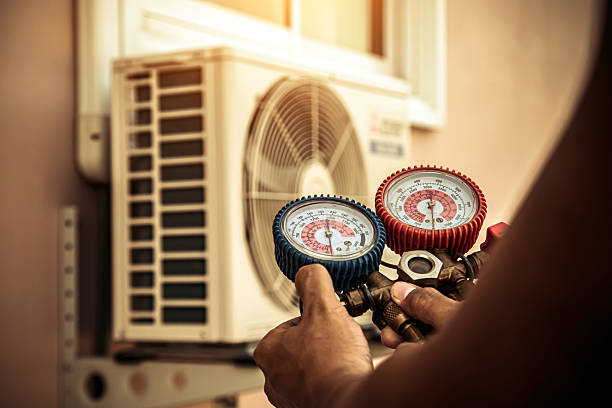 Professional Hvac technician working in Greenville, AL